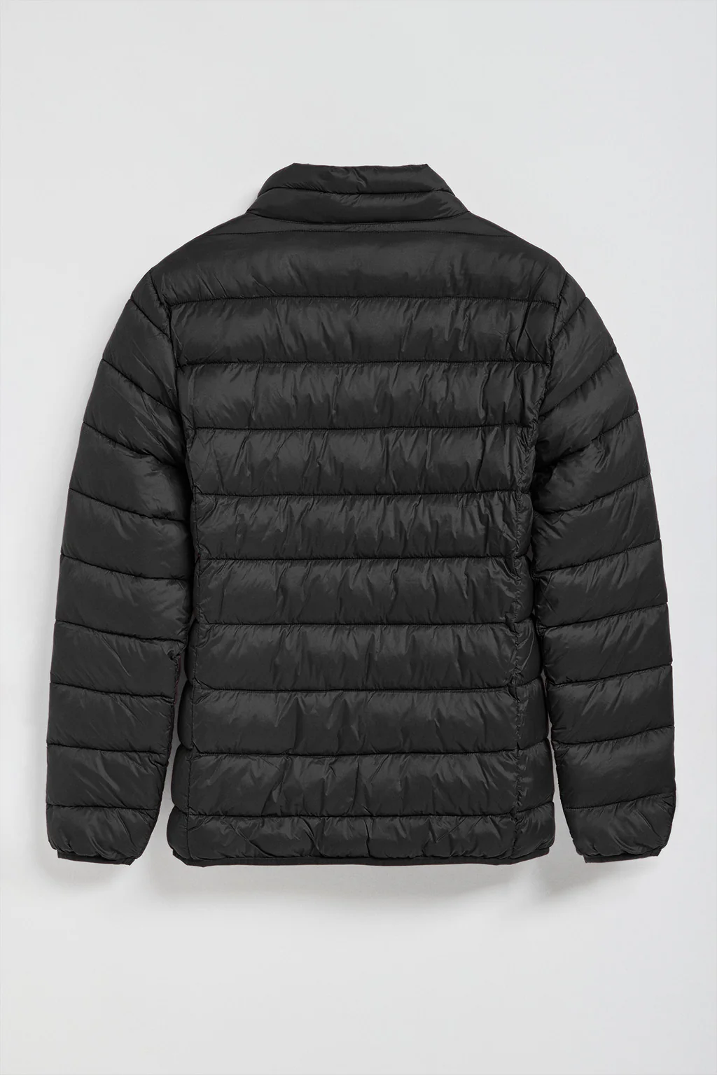 Chaqueta Chase ultralight negra con parche Rigby Go - Image 7