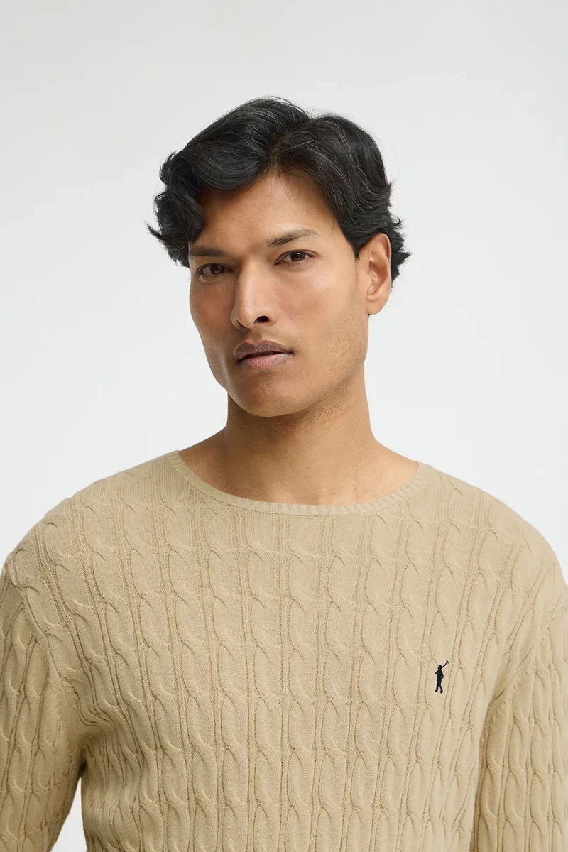 Jersey beige de punto trenzado y logo Rigby Go