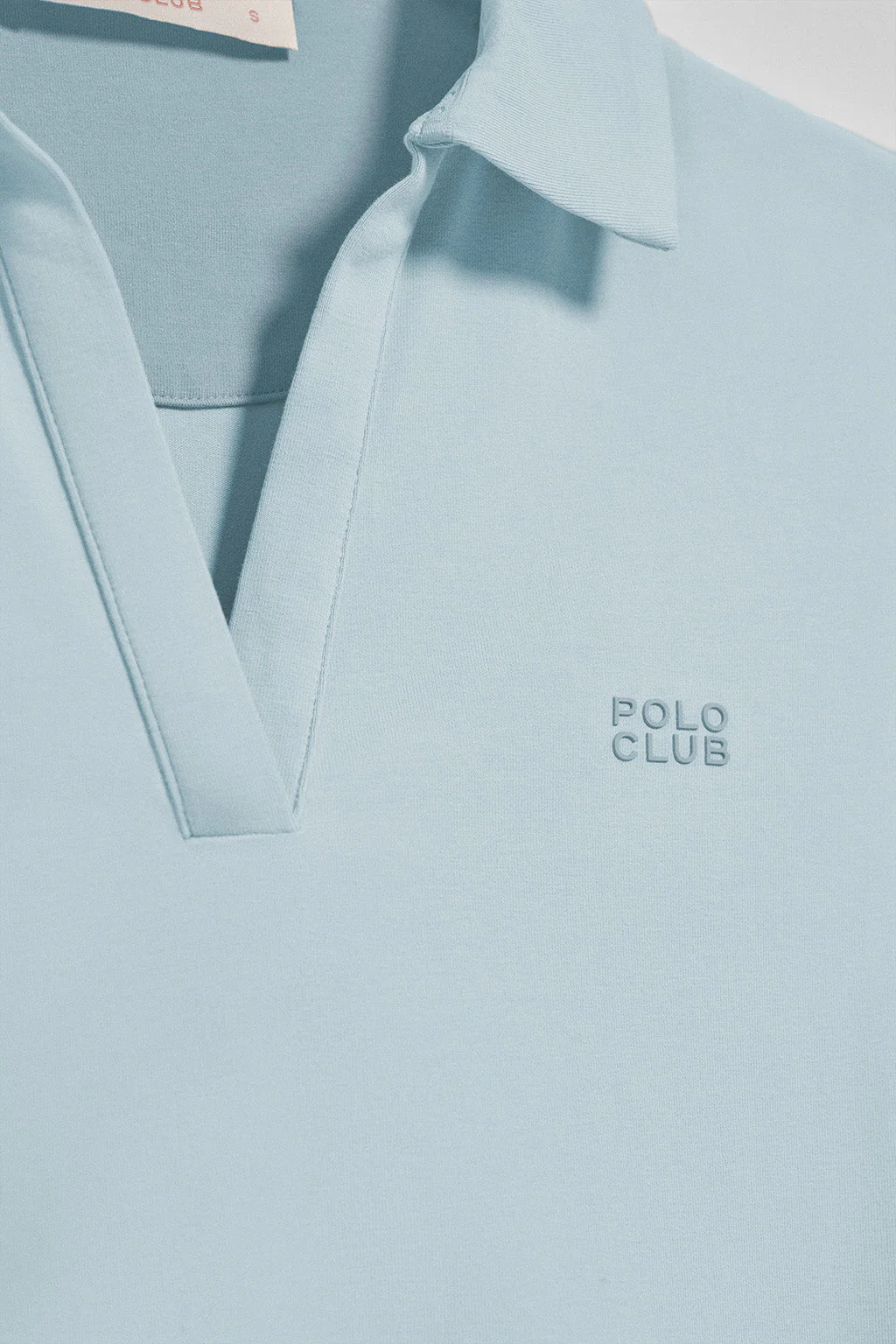 Polo Pedraza sin botones azul claro con logo engomado Polo Club - Image 7