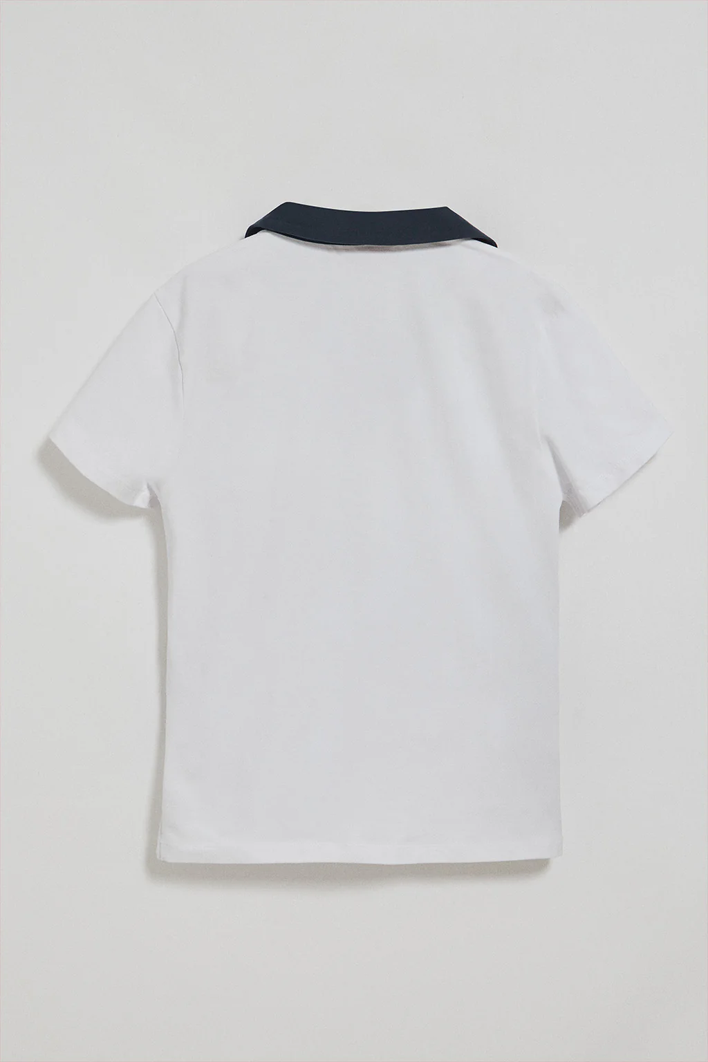 Polo Nautic sin botones blanco con detalle naútico en el pecho - Image 9