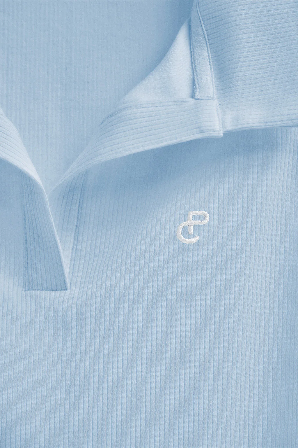 Polo azul claro sin mangas con monograma bordado - Image 10
