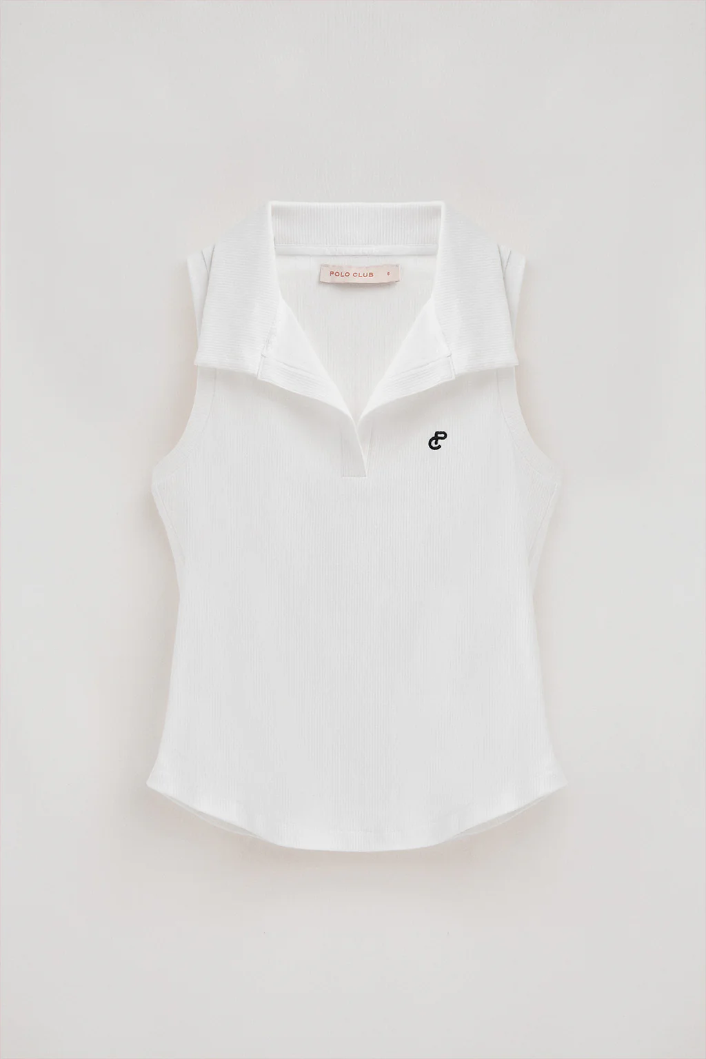 Polo blanco sin mangas con monograma bordado - Image 6