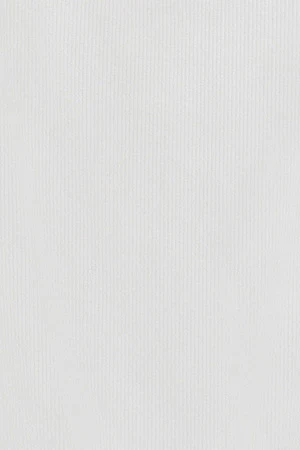 Polo blanco sin mangas con monograma bordado - Image 8