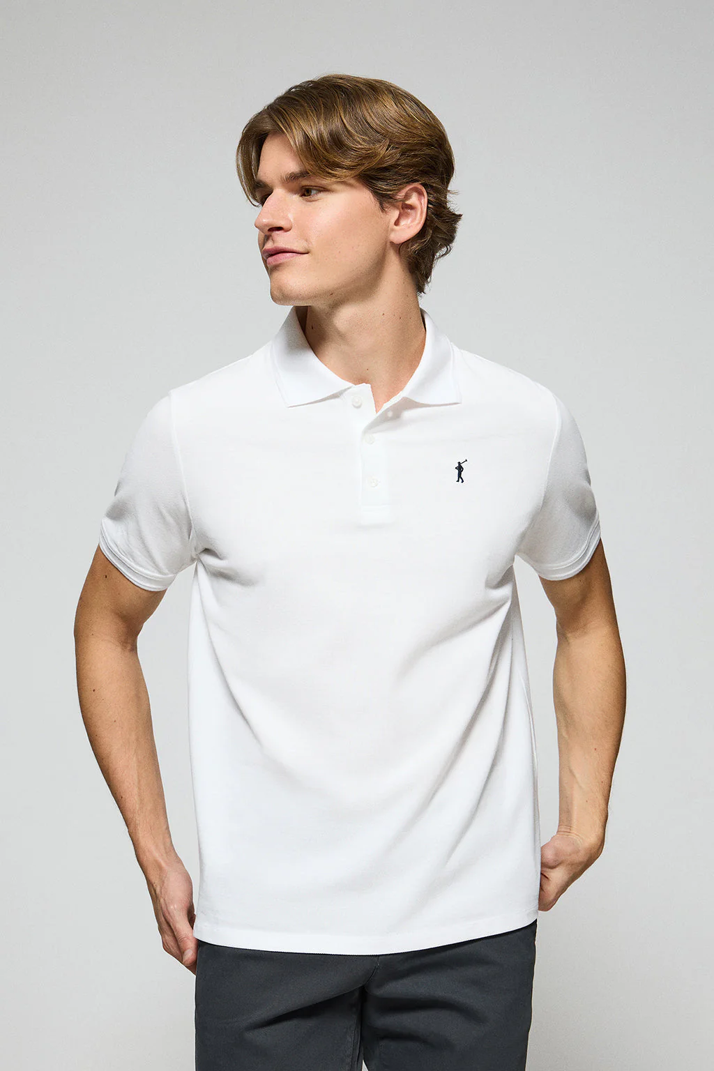 Polo de tres botones blanco con logo bordado Rigby Go