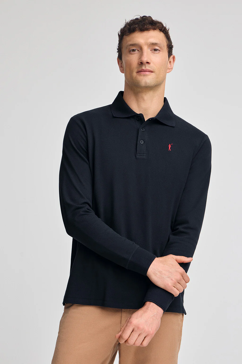 Polo azul marino de manga larga de tres botones y bordado Rigby Go
