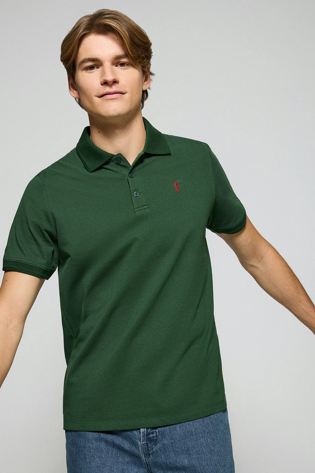 Polo de tres botones verde botella con logo bordado Rigby Go