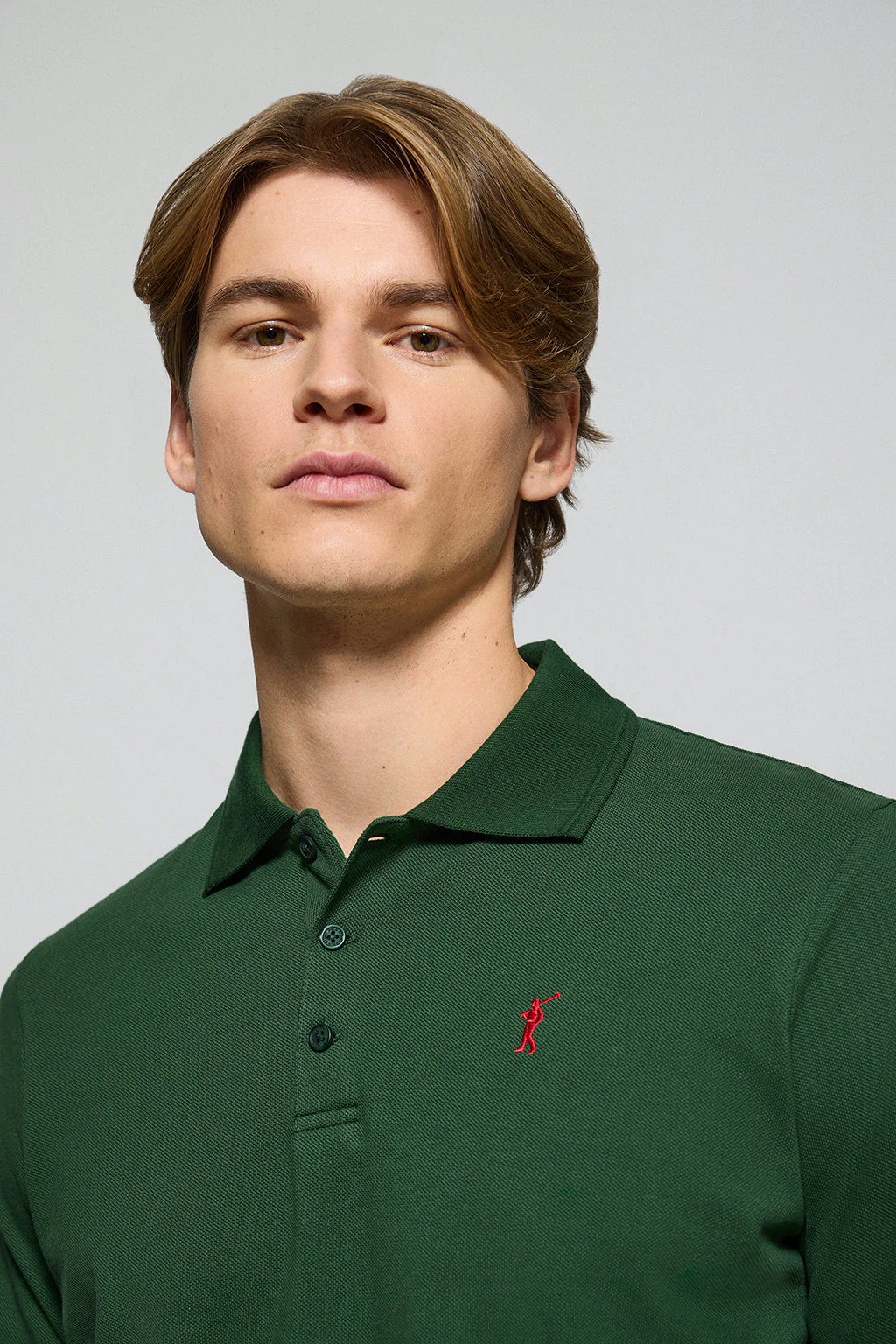 Polo de tres botones verde botella con logo bordado Rigby Go - Image 2