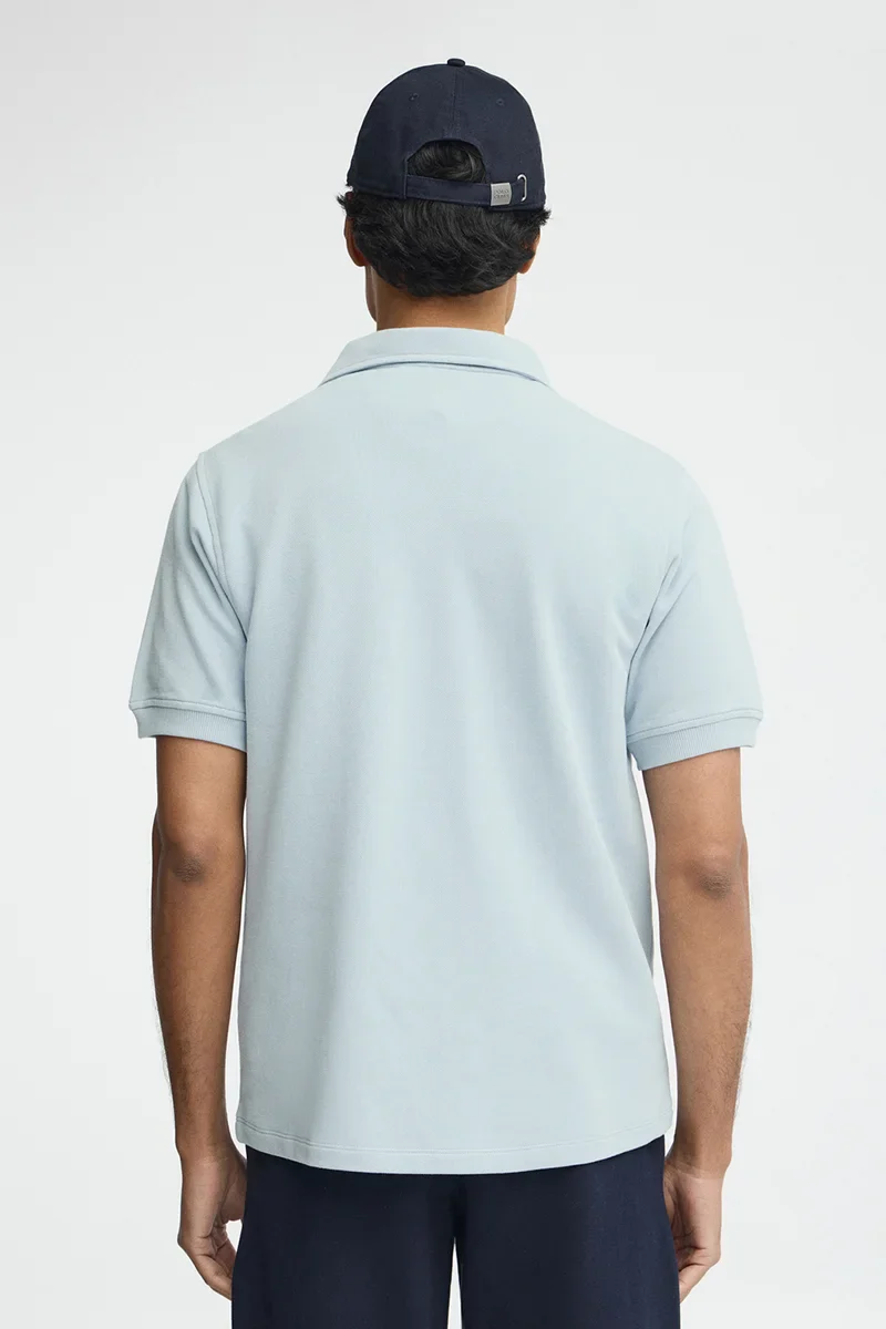 Polo azul claro de algodón con microestructura y bordado Rigby Go - Image 5
