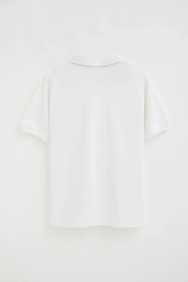 Polo blanco de algodón con microestructura y bordado Rigby Go - Image 8