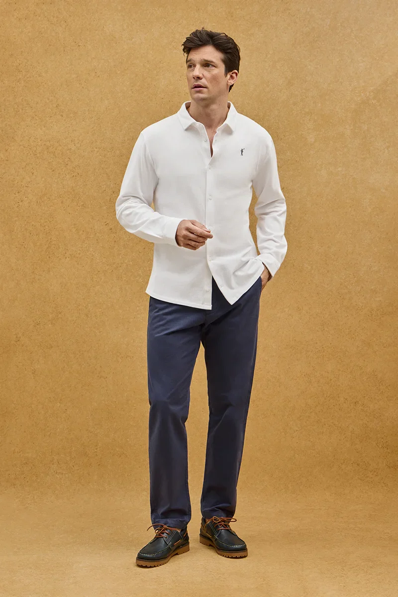 Polo blanco con abotonadura completa y bordado Rigby Go