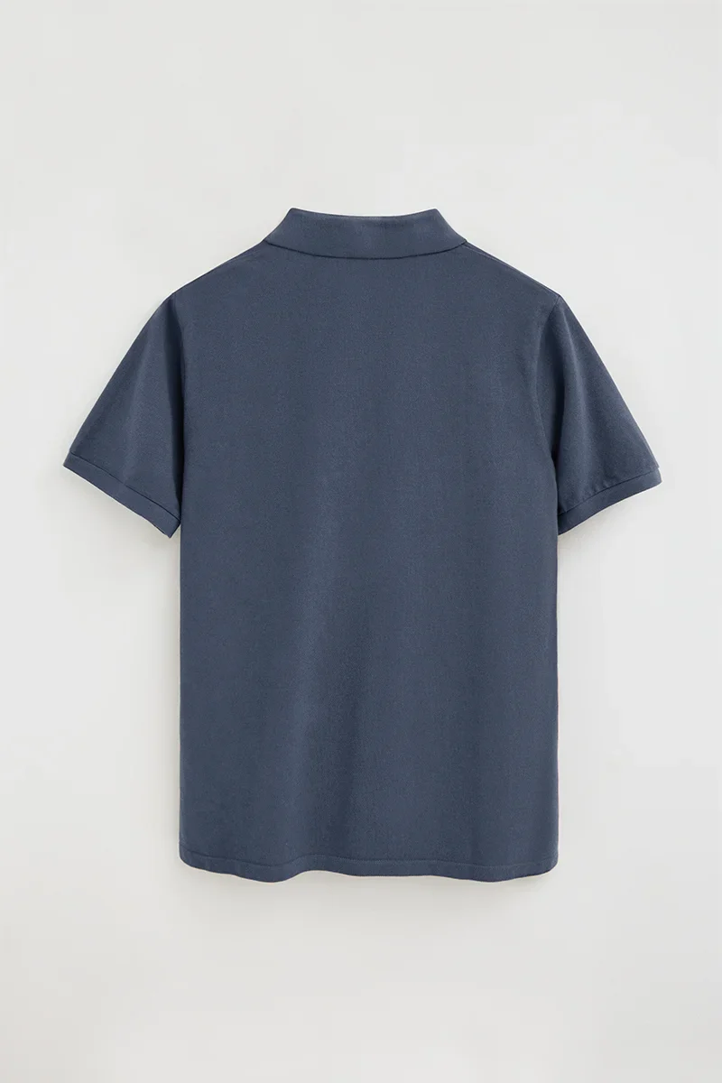 Polo azul denim teñido en prenda con logo bordado Rigby Go - Image 7
