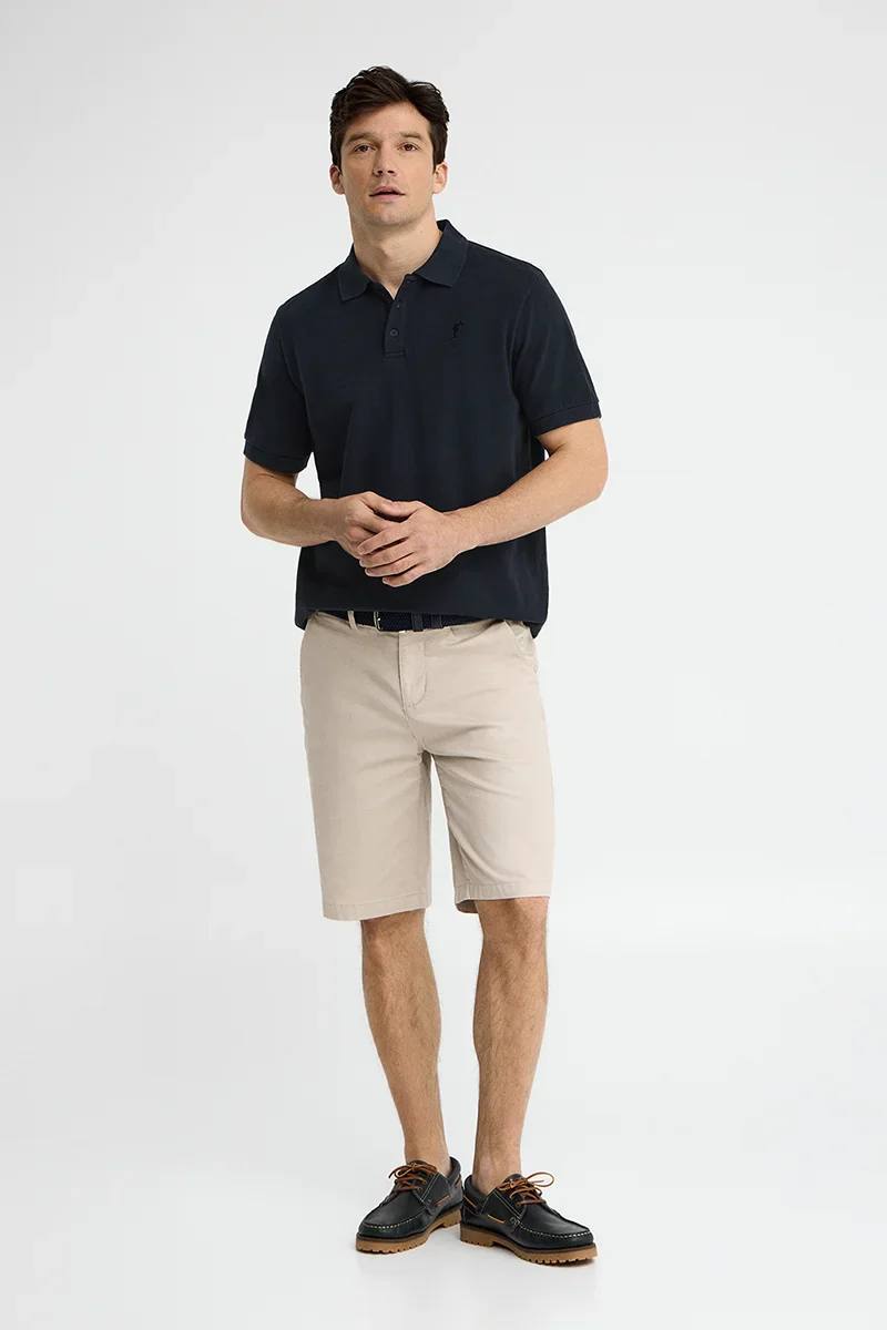 Polo azul marino teñido en prenda con logo bordado Rigby Go - Image 4