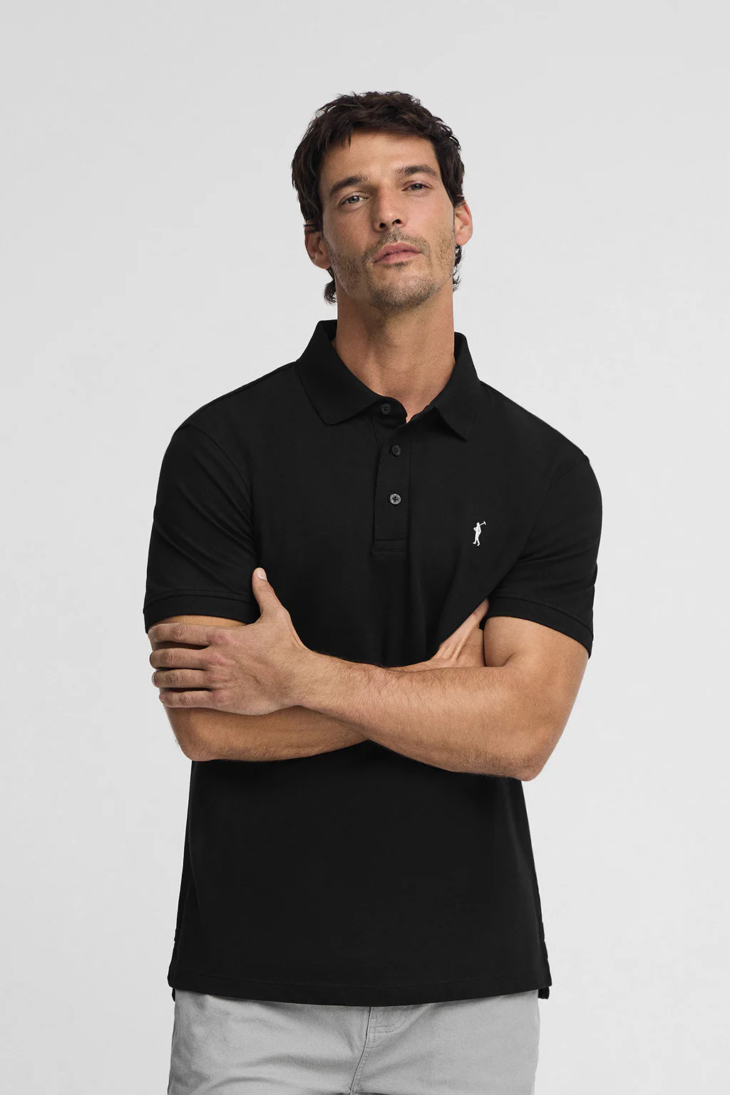Polo negro slim de piqué con logo bordado Rigby Go