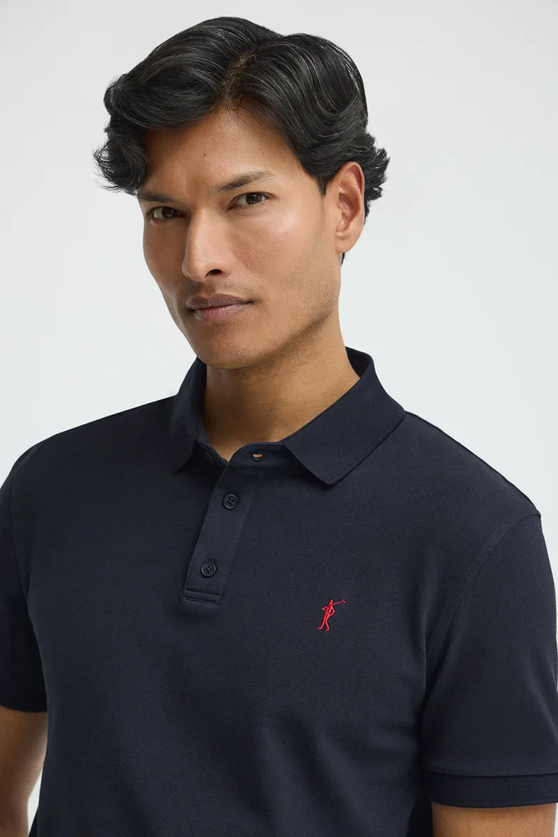 Polo azul marino de corte slim con bordado Rigby Go