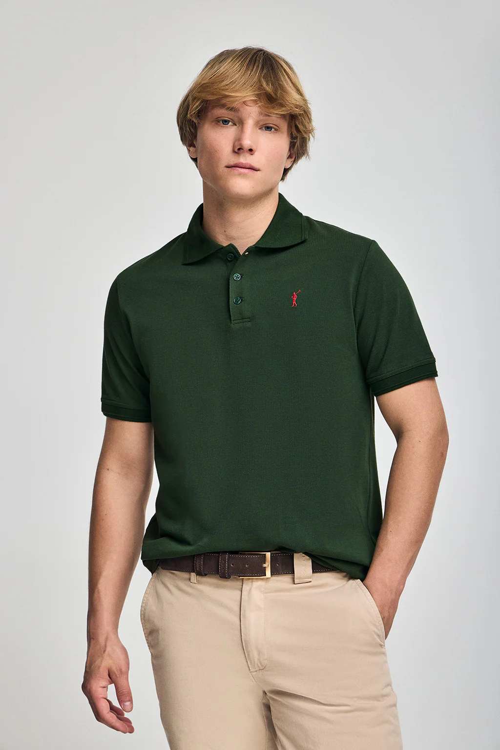 Polo verde botella de manga corta y tres botones con logo bordado Rigby Go