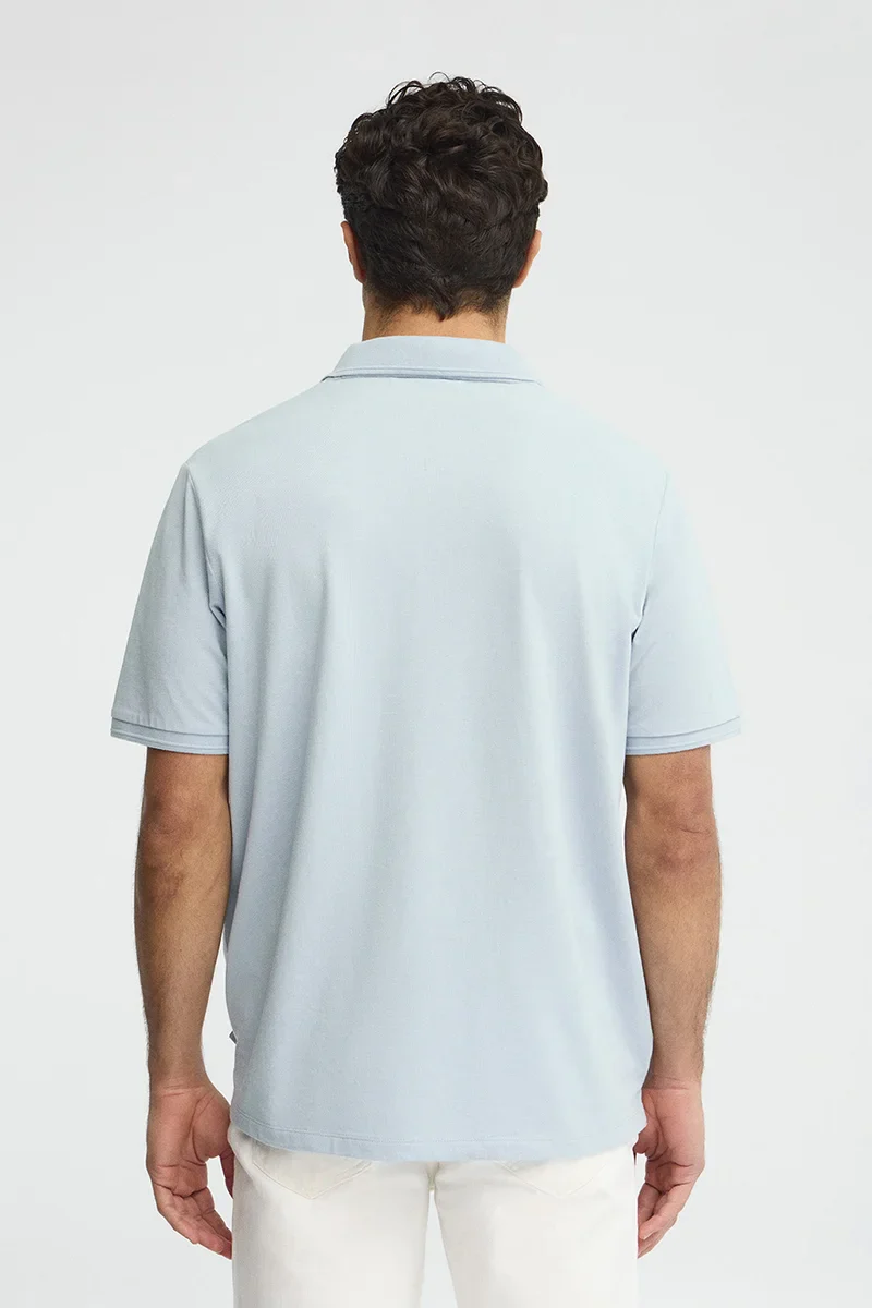 Polo azul claro de manga corta con logo bordado Rigby Go - Image 5