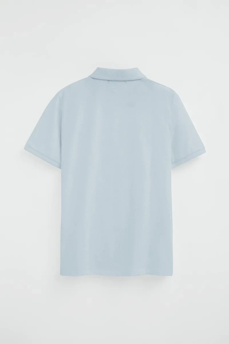 Polo azul claro de manga corta con logo bordado Rigby Go - Image 8