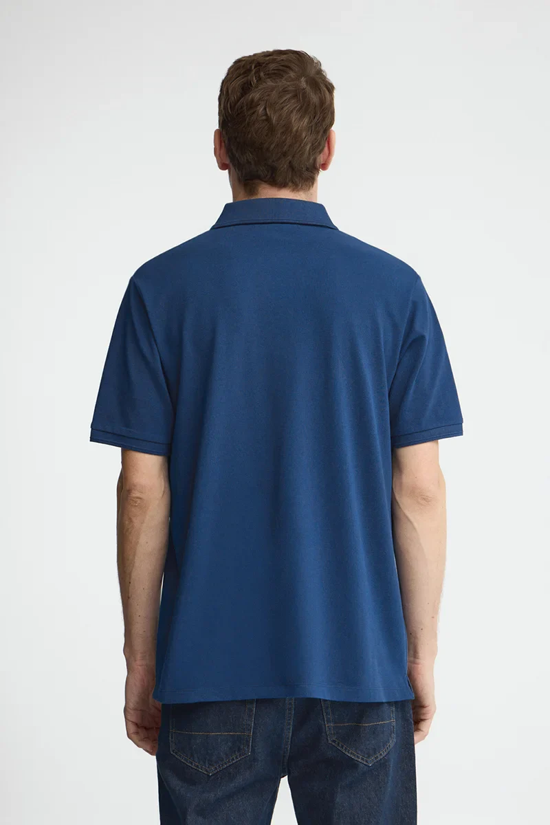 Polo azul índigo de manga corta con logo bordado Rigby Go - Image 5