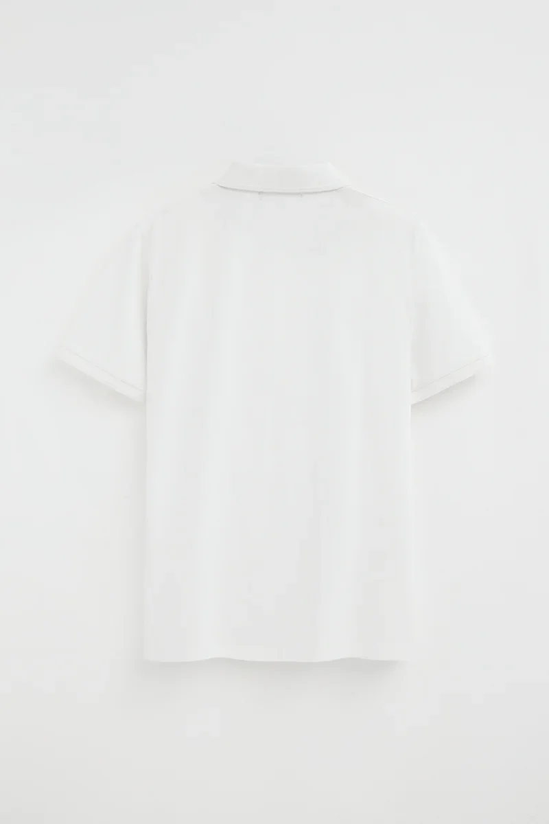 Polo blanco de manga corta con logo bordado Rigby Go - Image 9