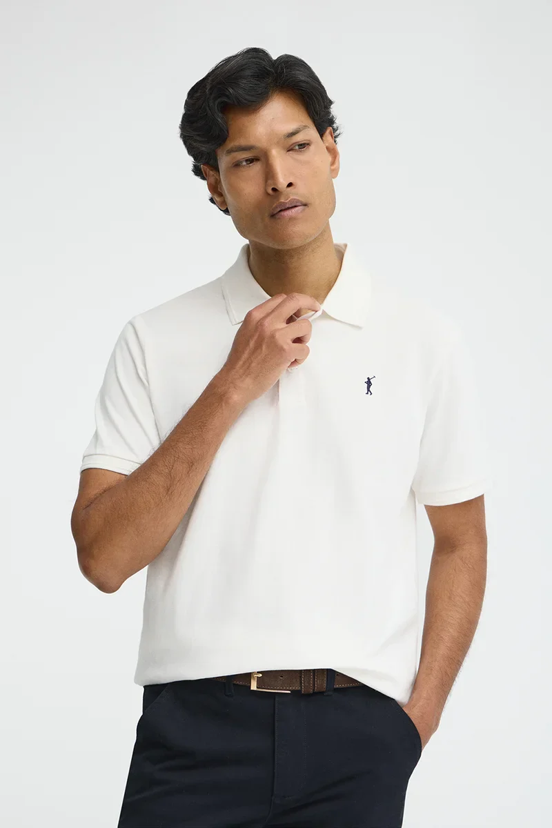 Polo color crudo de manga corta con logo bordado Rigby Go