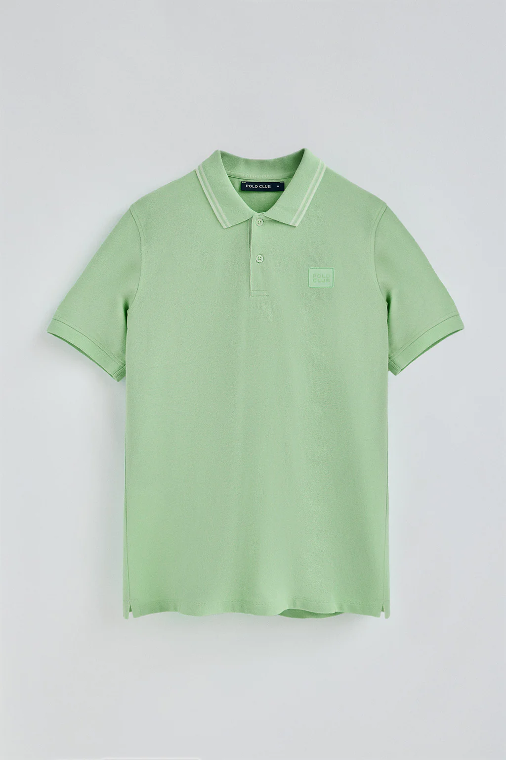 Polo color menta de manga corta y dos botones con detalle en el pecho - Image 8