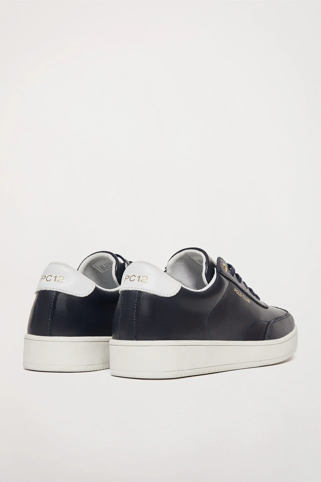 Zapatilla casual azul marino de piel con detalles dorados - Image 3